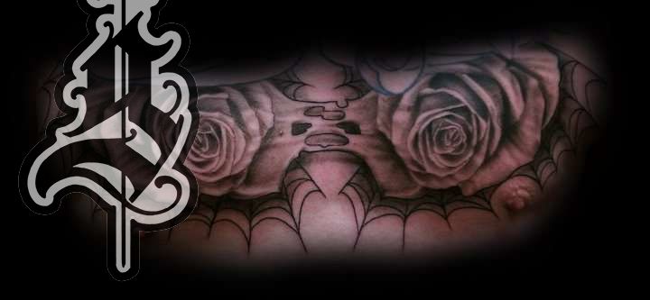 Roses_black_and_grey_tattoo_chest_piece_jason_frieling