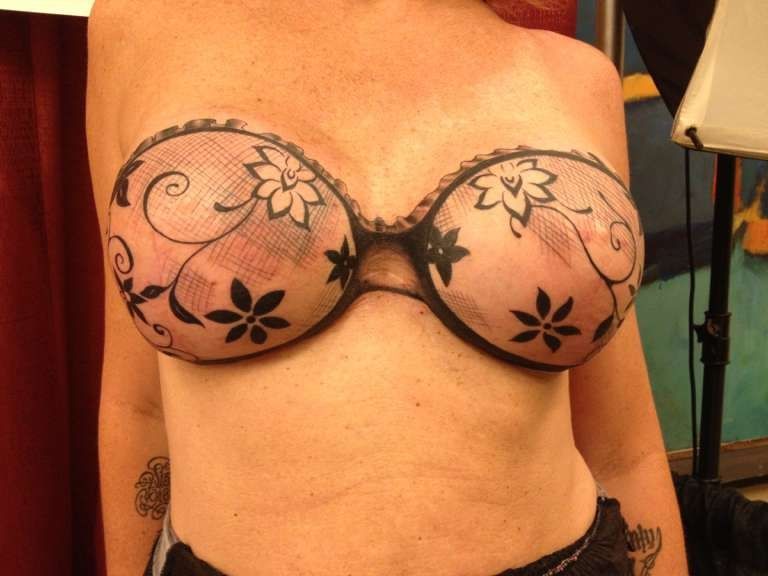 Breast cancer survivor bra tattoo.