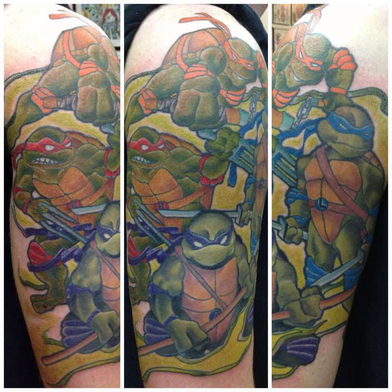 black and gray ninja turtles with color details tattoo by Sorin Gabor   Tattoos