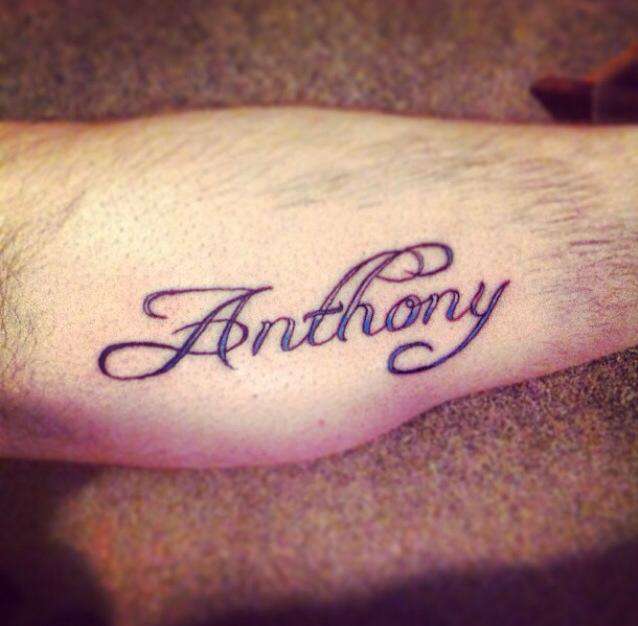 Anthony Velarde  Blessed script tattoo