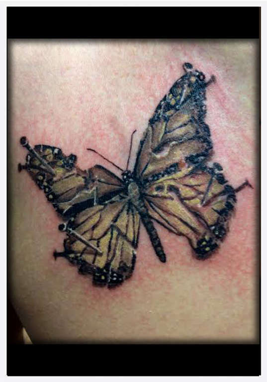 Brandon_miller_eternal_tattoo_and_body_piercing_pinned_butterly_photorealism