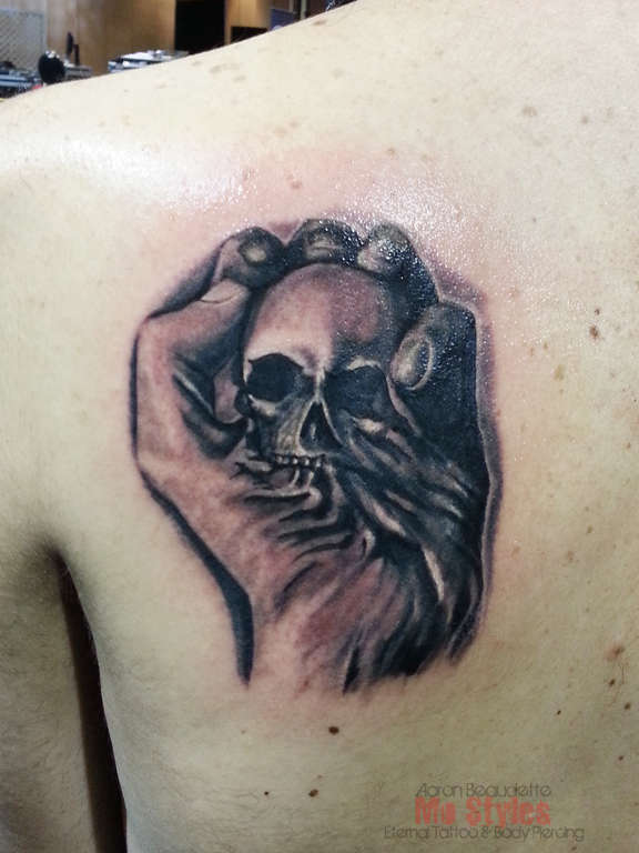 Melting skull by Luca De Gennaro during his guest at The Grand Reaper in  San Diego CA  rtattoos