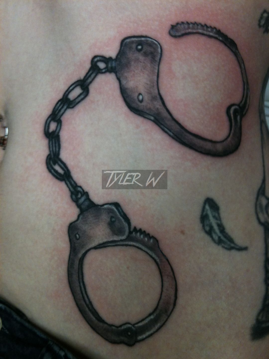 Share more than 74 handcuff tattoo ideas - in.eteachers