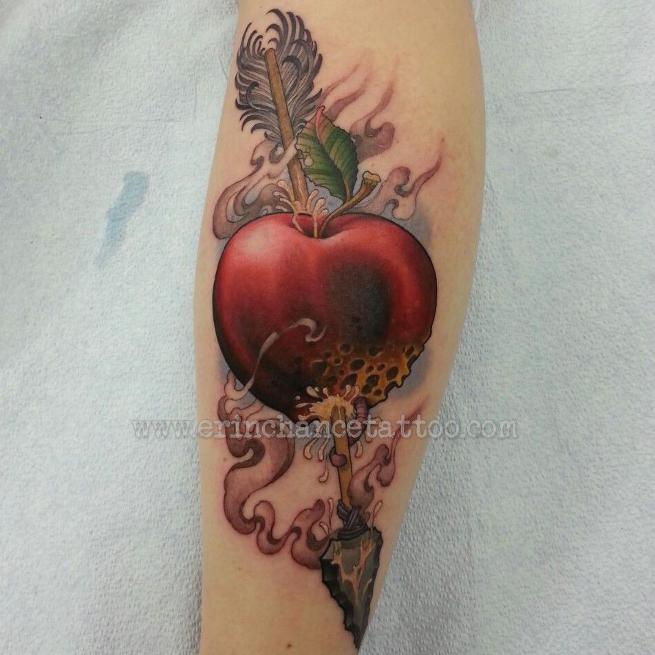 Traditional style heart and dagger tattoo located on