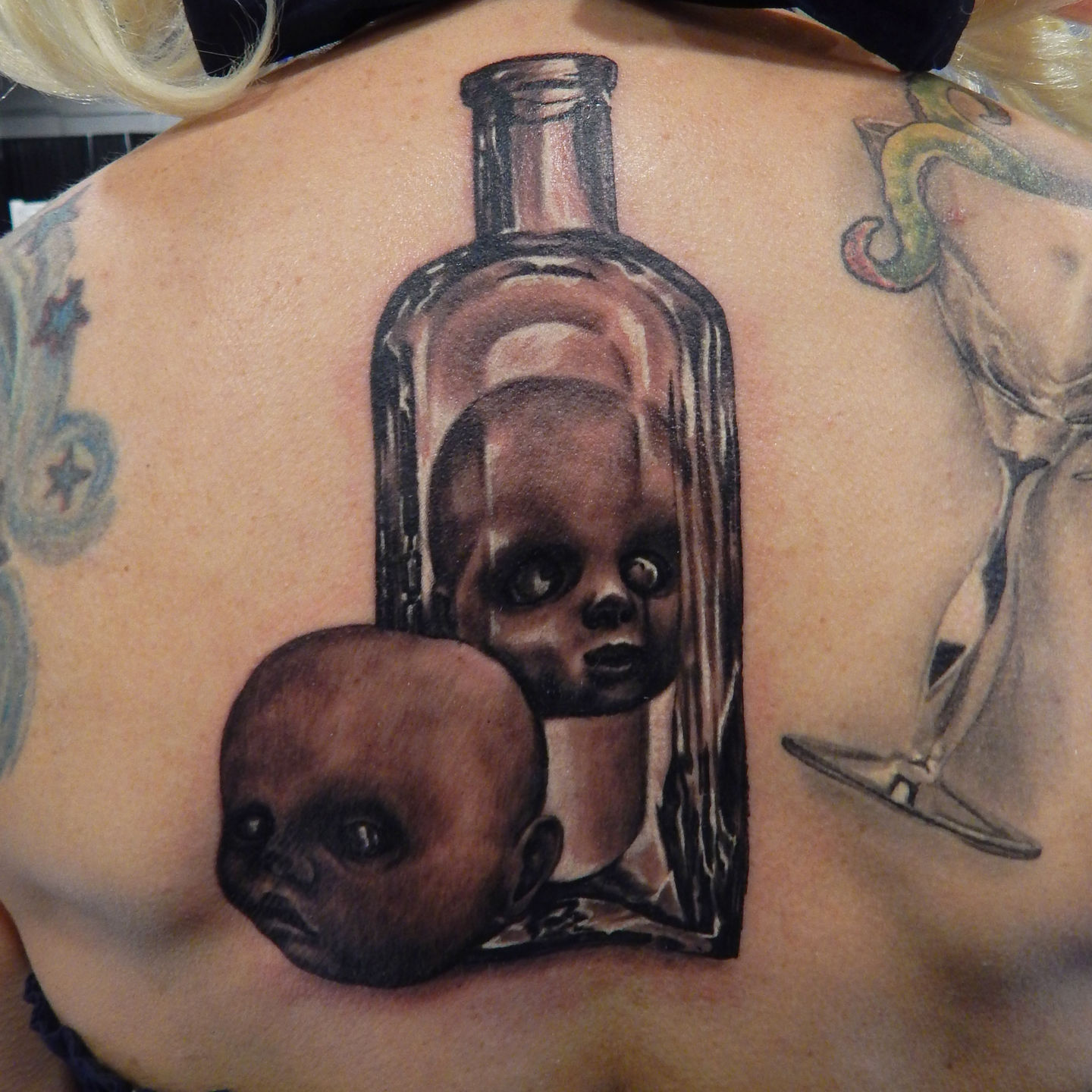 Meezle_dollhead_bottle