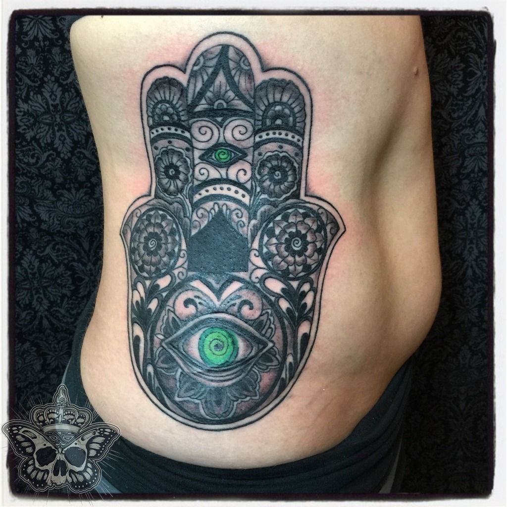 inkyknuckles:hamsa-talisman-tattoo-rib-cage-tattoo