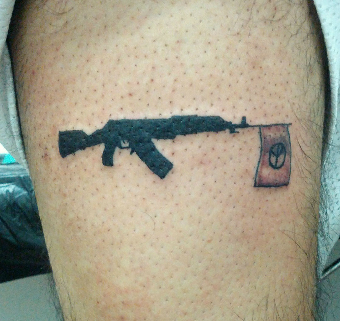 Lynyrd Skynart Tattoos - Top view of an assault rifle with scope. | Facebook