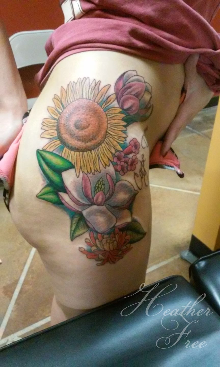 flower hip tattoos