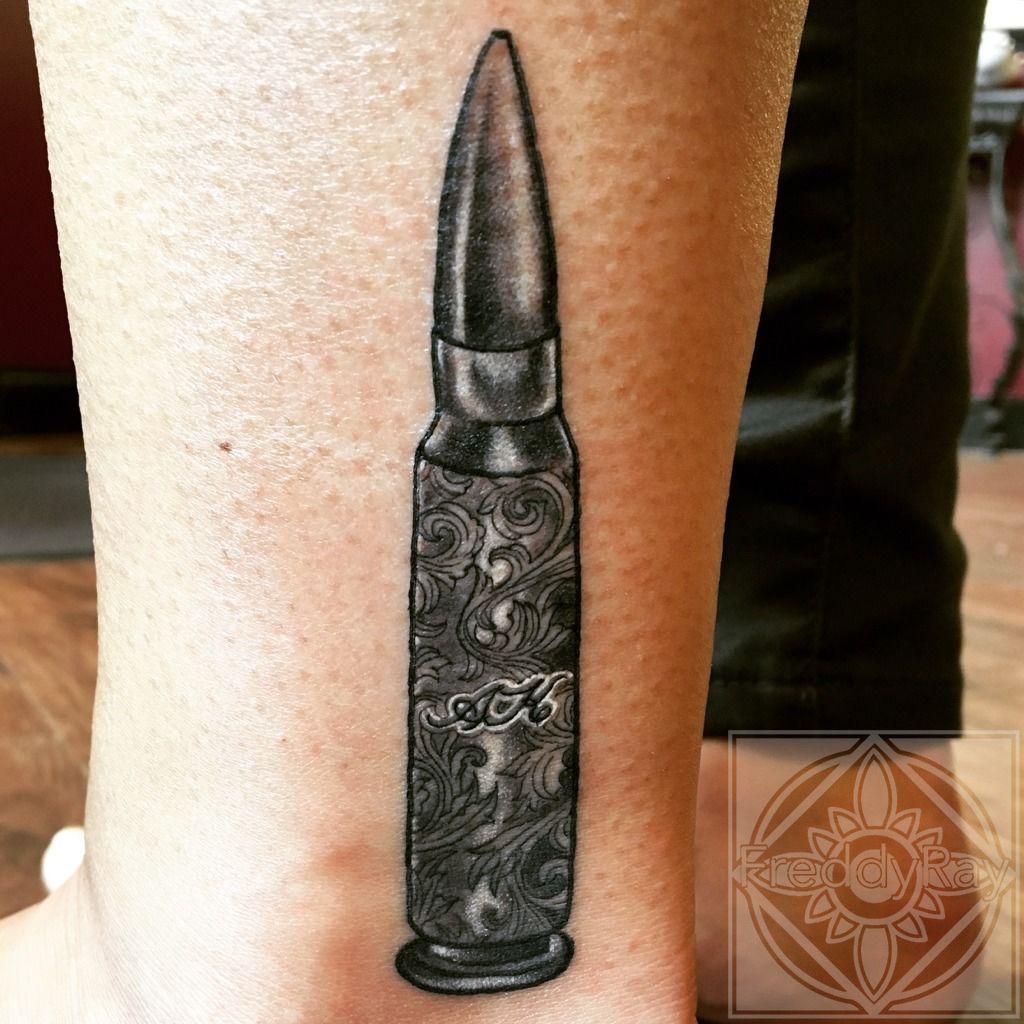 Bonnie Seeley Lips and bullet by Bonnie Seeley TattooNOW