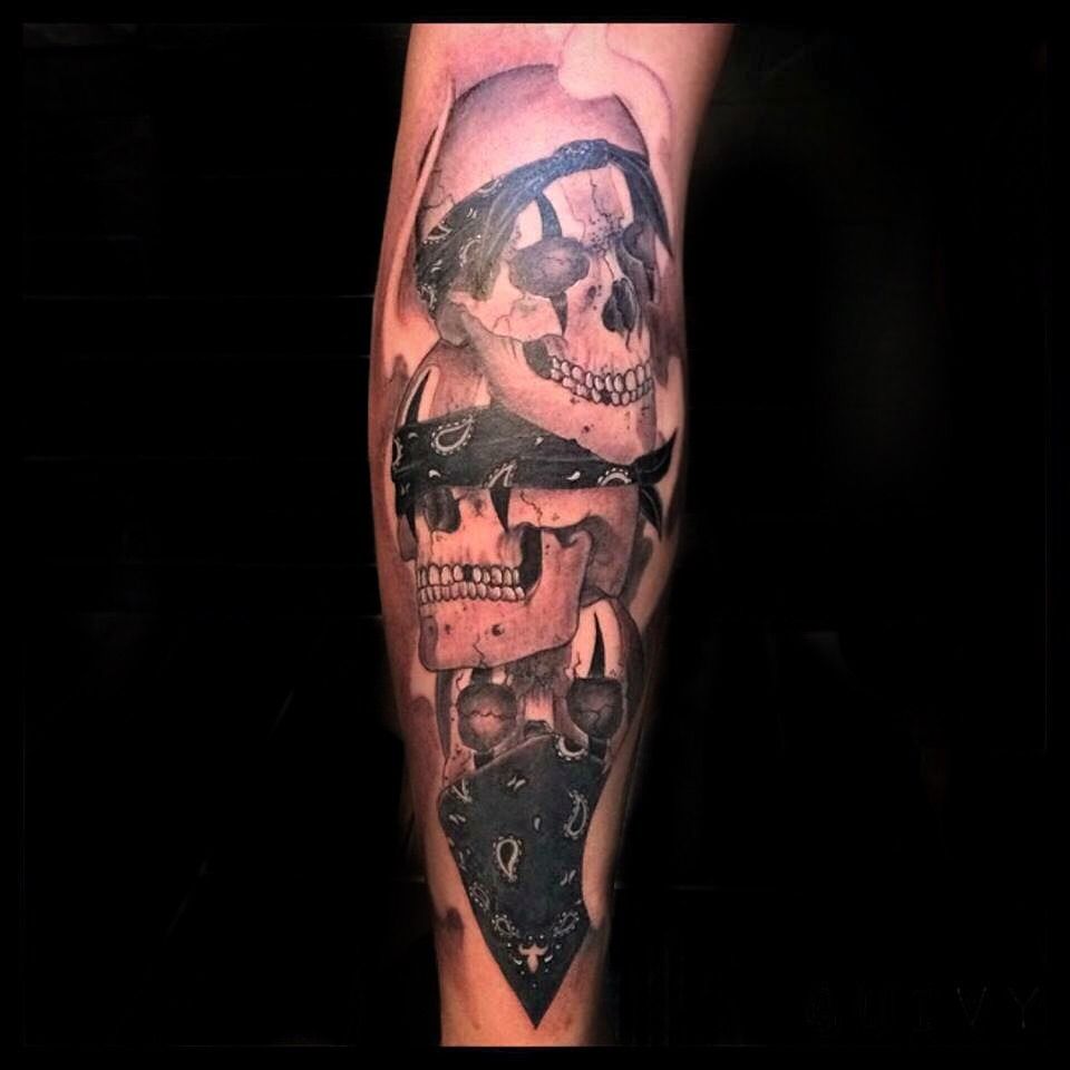 Feminine Skull With bandana Tattoo on Thigh