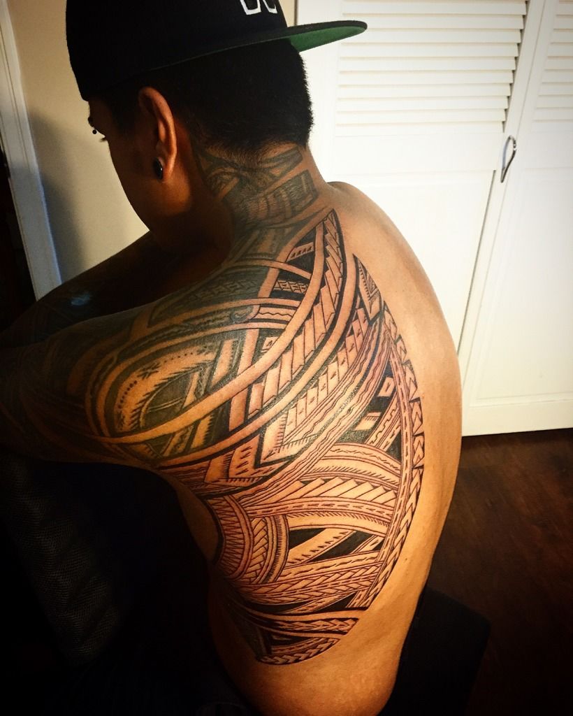 Épinglé sur Polynesian torso tattoo