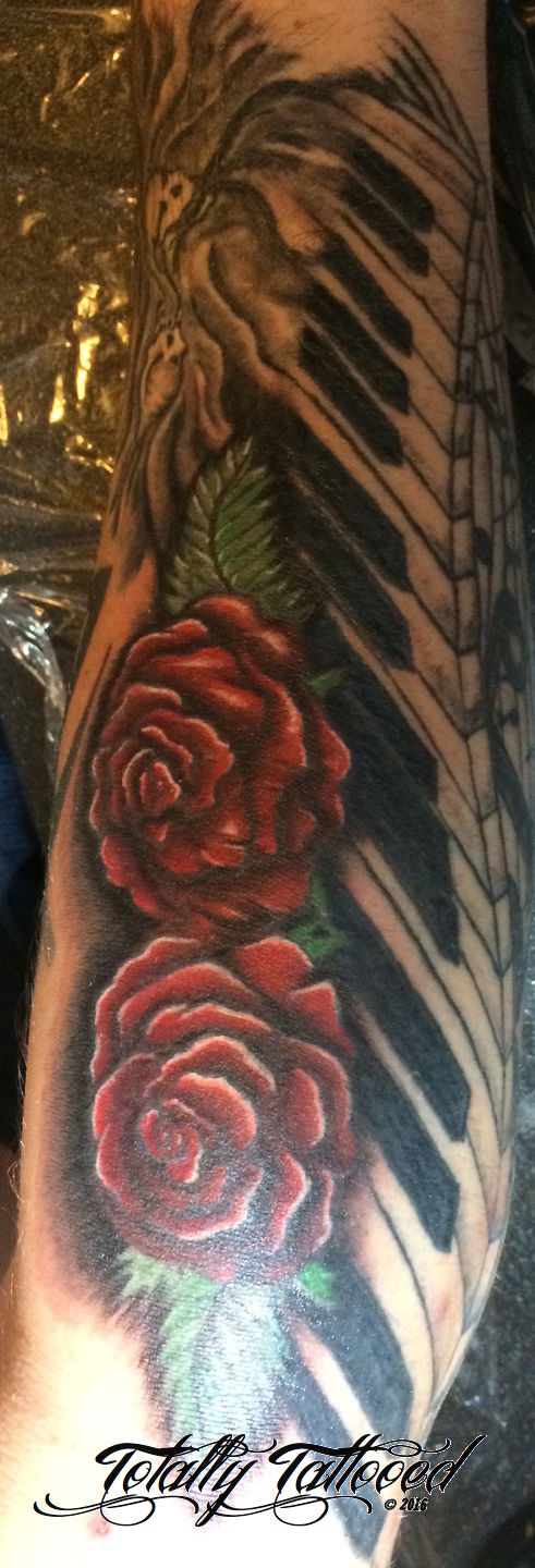 Tattoo uploaded by Austin Bryant • Music related sleeve #music  #blackandgrey #eye #rose #piano • Tattoodo