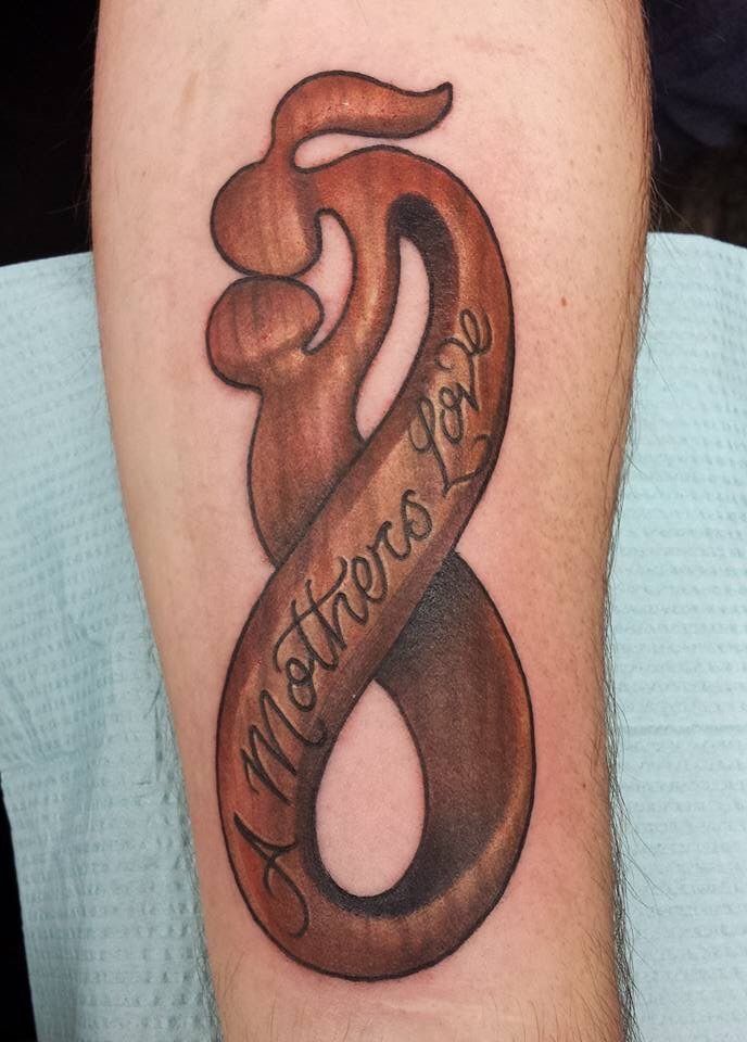 cledleytattoos:mother-son-statue-statue-mother-son-wood-woodgrain-texture -color-tattoo