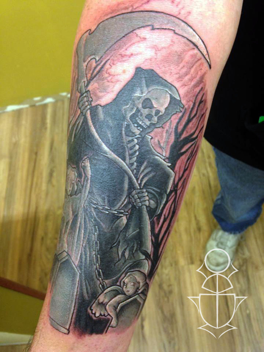 Skull forearm tattoo by Travis Greenough TattooNOW