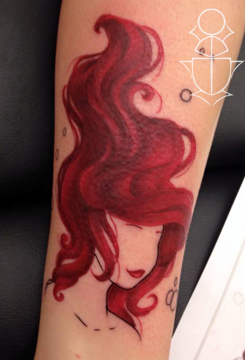 15 Simple and Traditional Mermaid Tattoo Designs