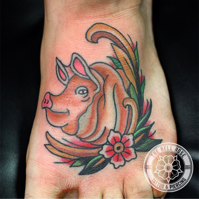 Frank_fontanez-pig-on-foot-the-bell-rose-tattoo-and-piercing-mobile-alabama