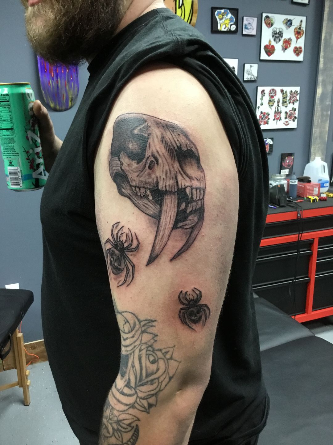 Sabertooth skull johnotattooer  Flower tattoo Animal tattoo Body art