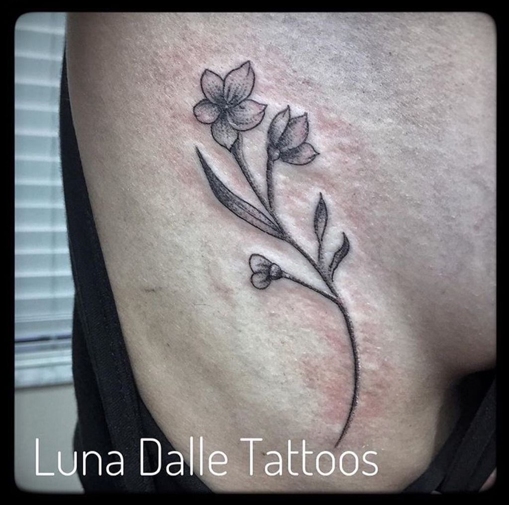Simple black and grey flower tattoo - Tattoogrid.net