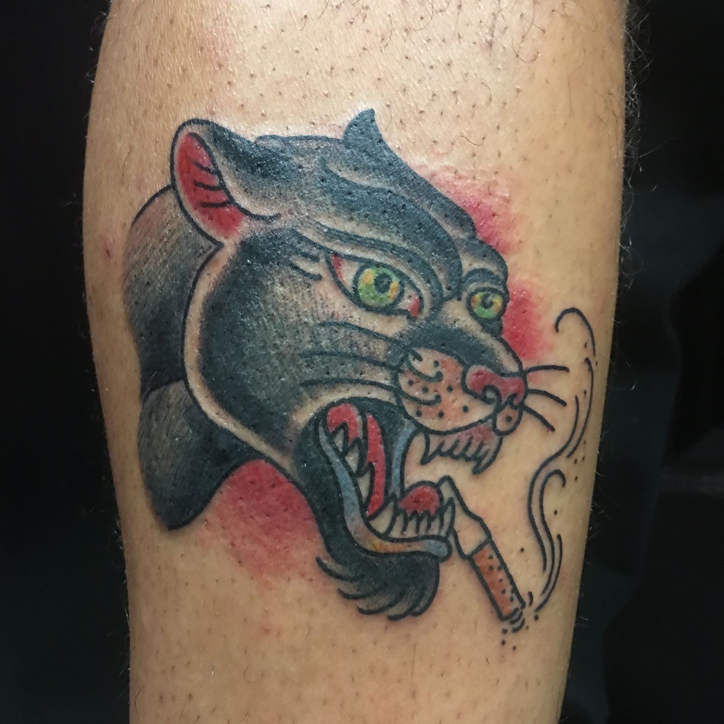 Premium Vector  Black panther head and dagger tattoo