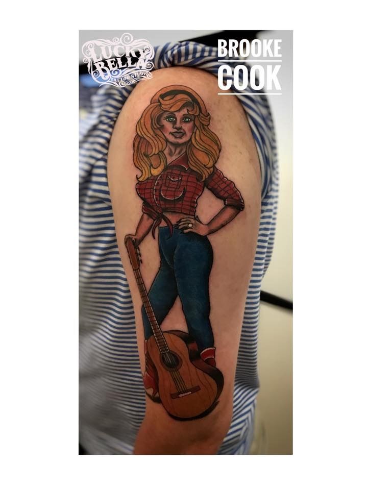 Does Dolly Parton have tattoos The singer finally reveals if shes covered  in ink  HELLO