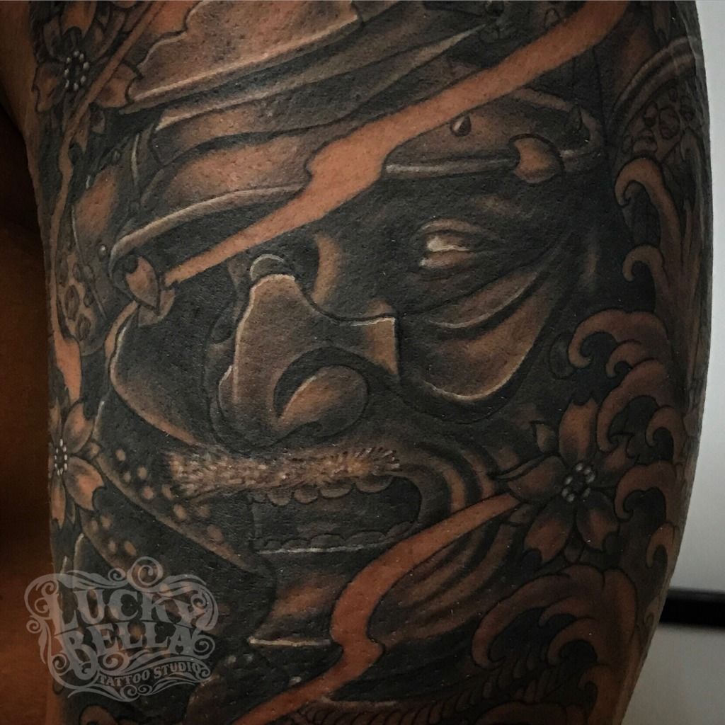 NEED HELP! I want this Japanese Samurai Warrior, but i already have this  tattoo, any ideas on how to incorporate the tattoo i already have with the  possible samurai tattoo? Thanks :) :