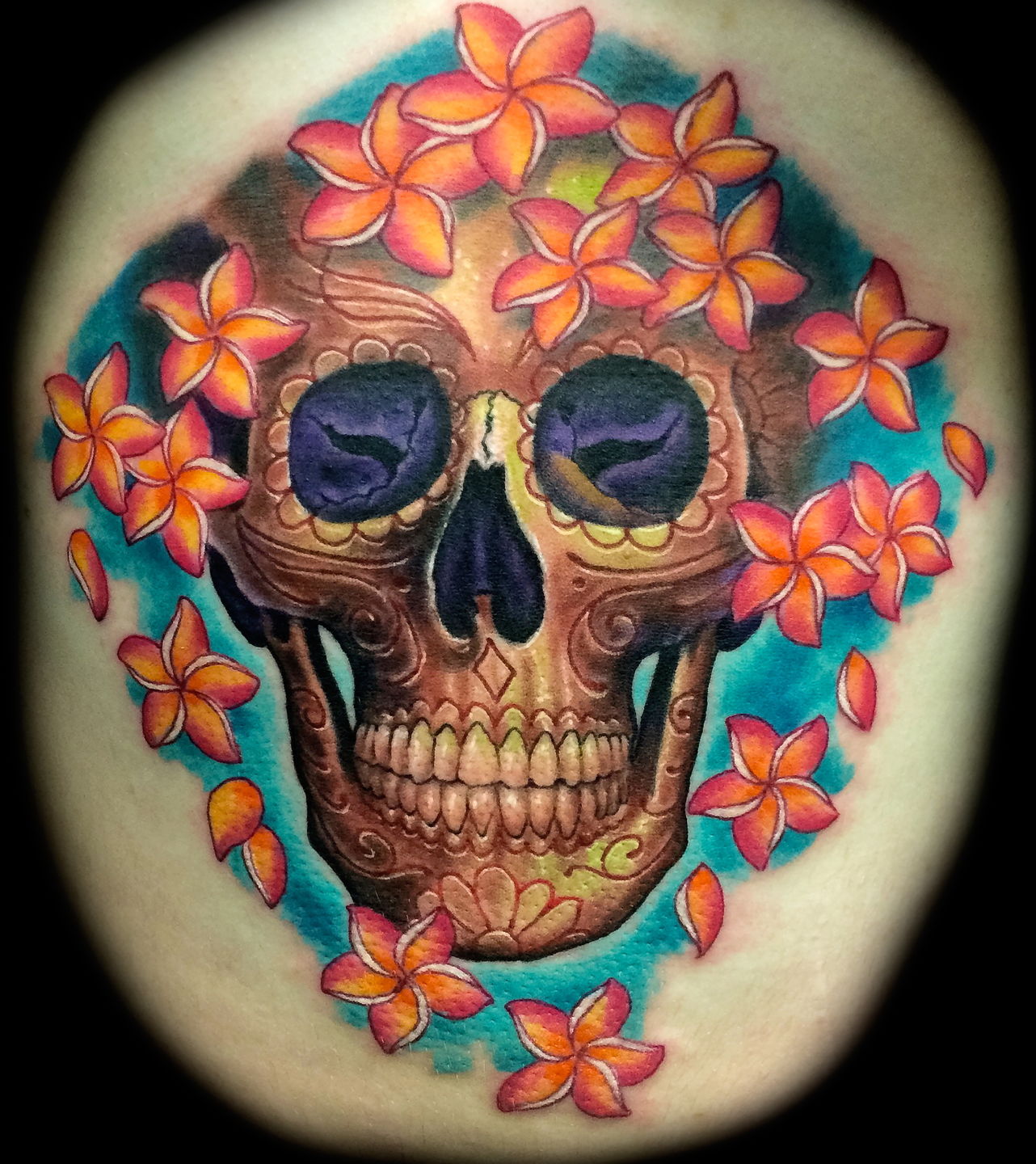 Las-vegas-tattoo-artist_joe-riley_skull-plumeria-flowers-tattoo-best-las-vegas-tattoos-shops-artists