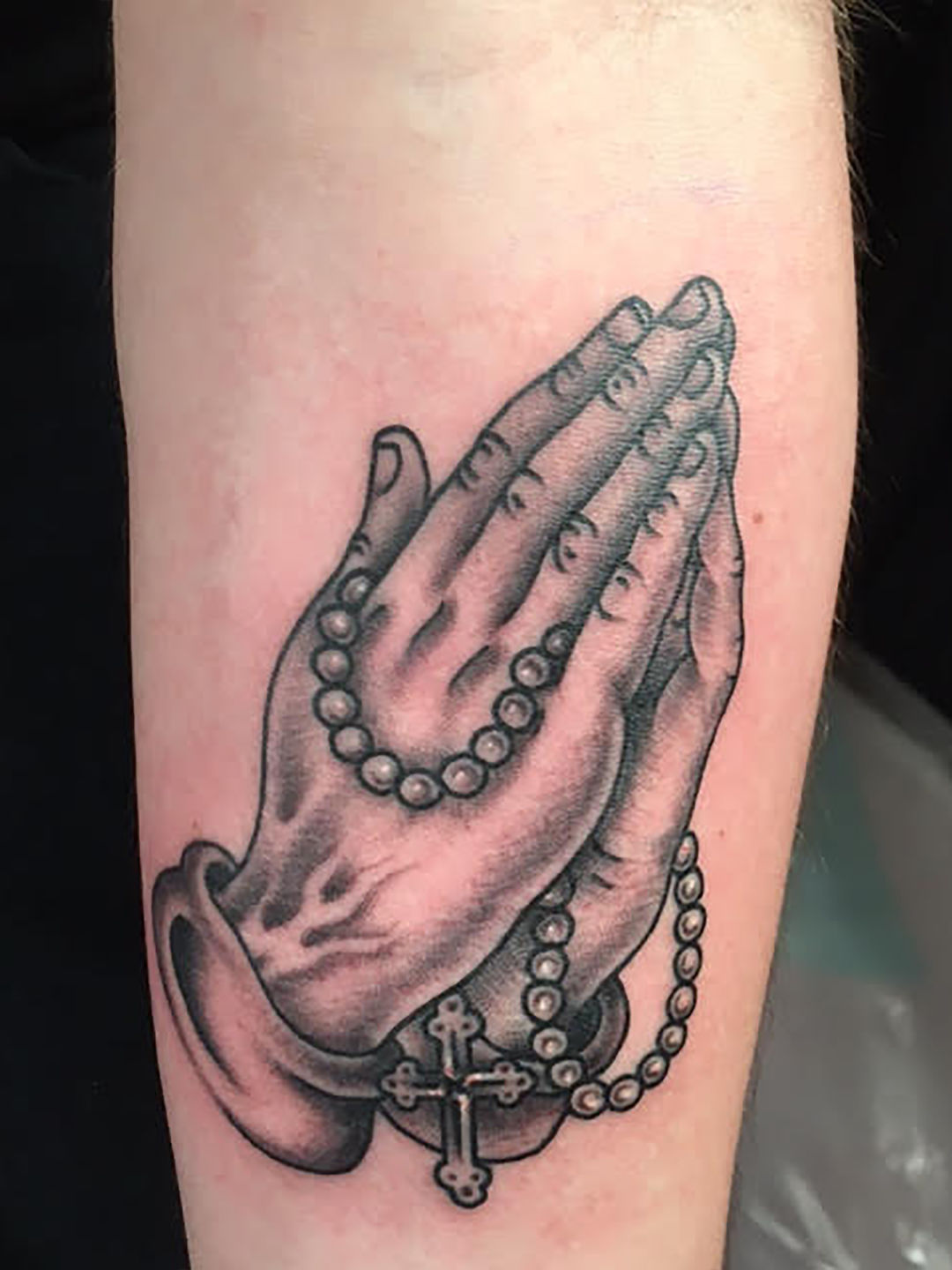 Brent_praying_hands