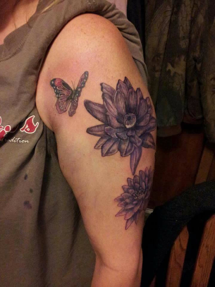 water lily flower tattoo with butterfly