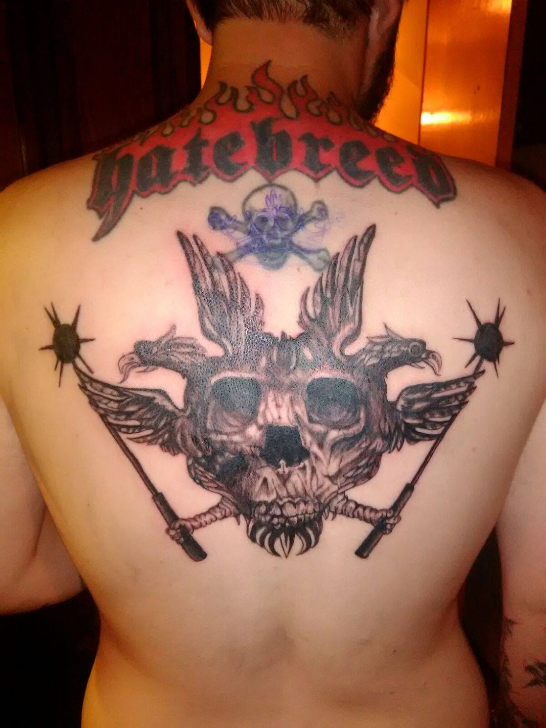 skull and crossbones chest tattoo