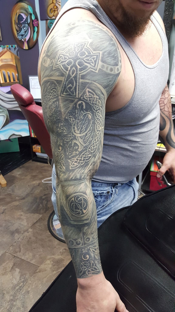 celtic armor sleeve tattoo