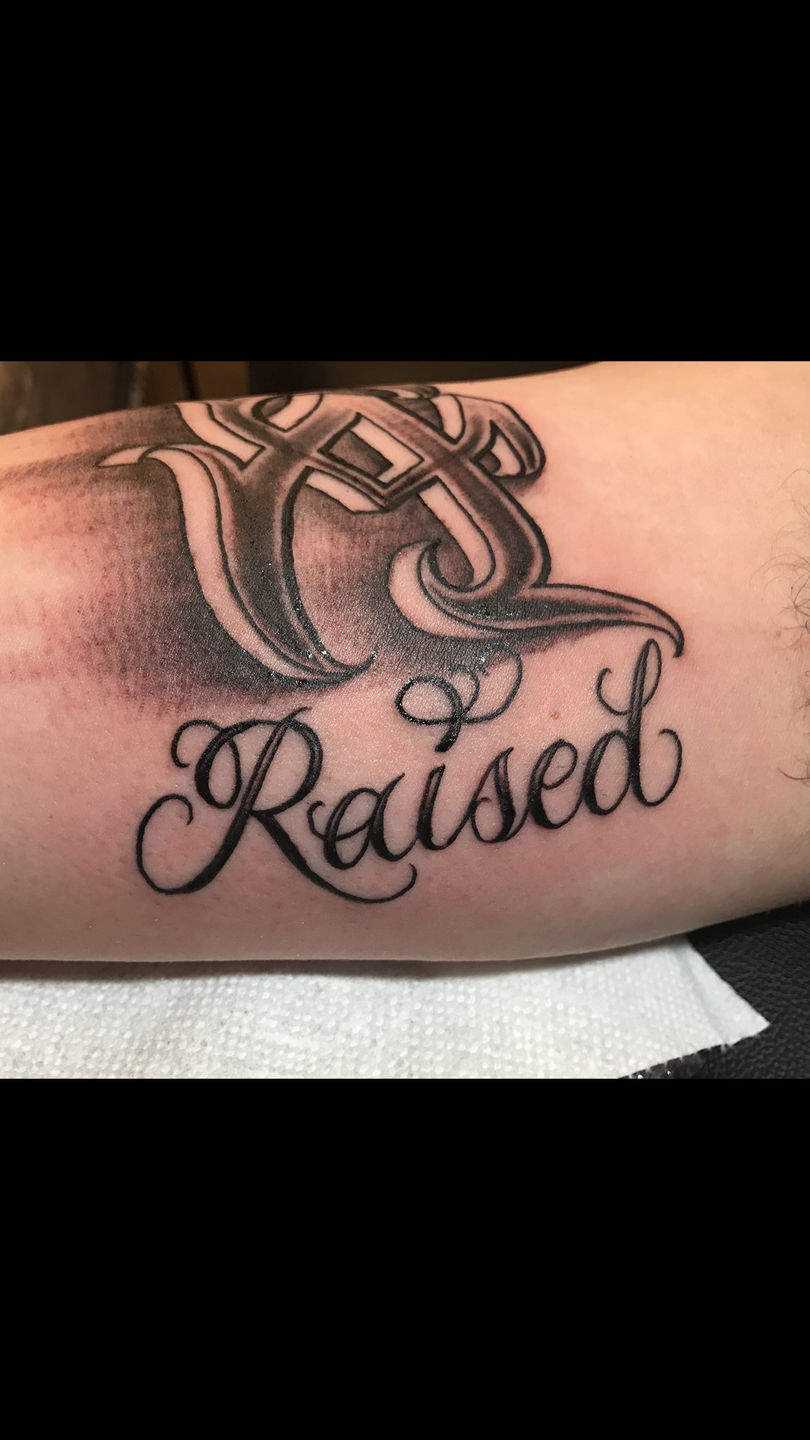 Tattoomikey raised script lettering