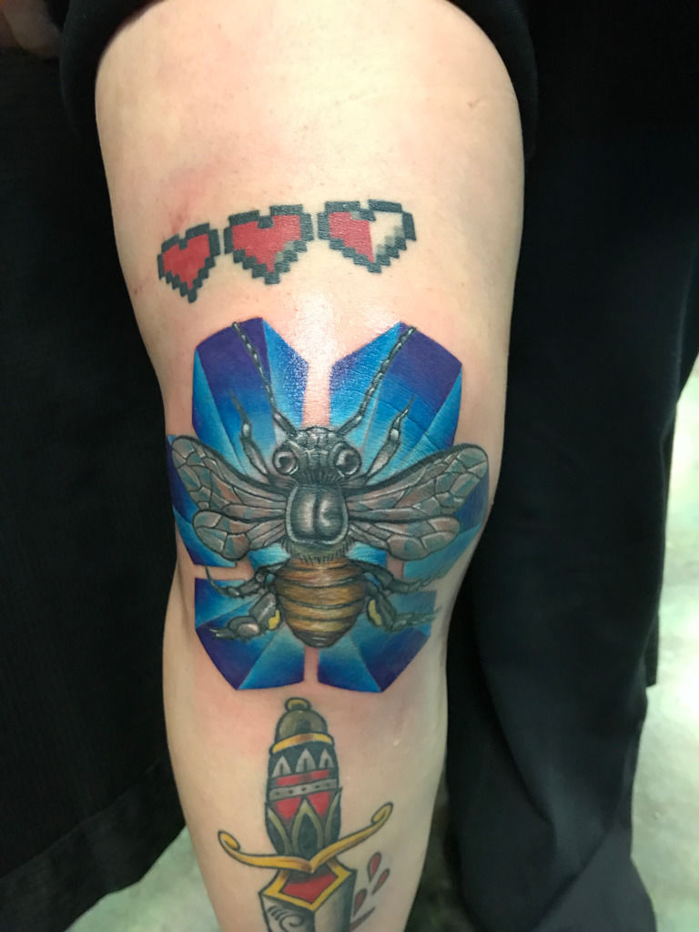 bee and honeycomb tattoo kneeTikTok Search