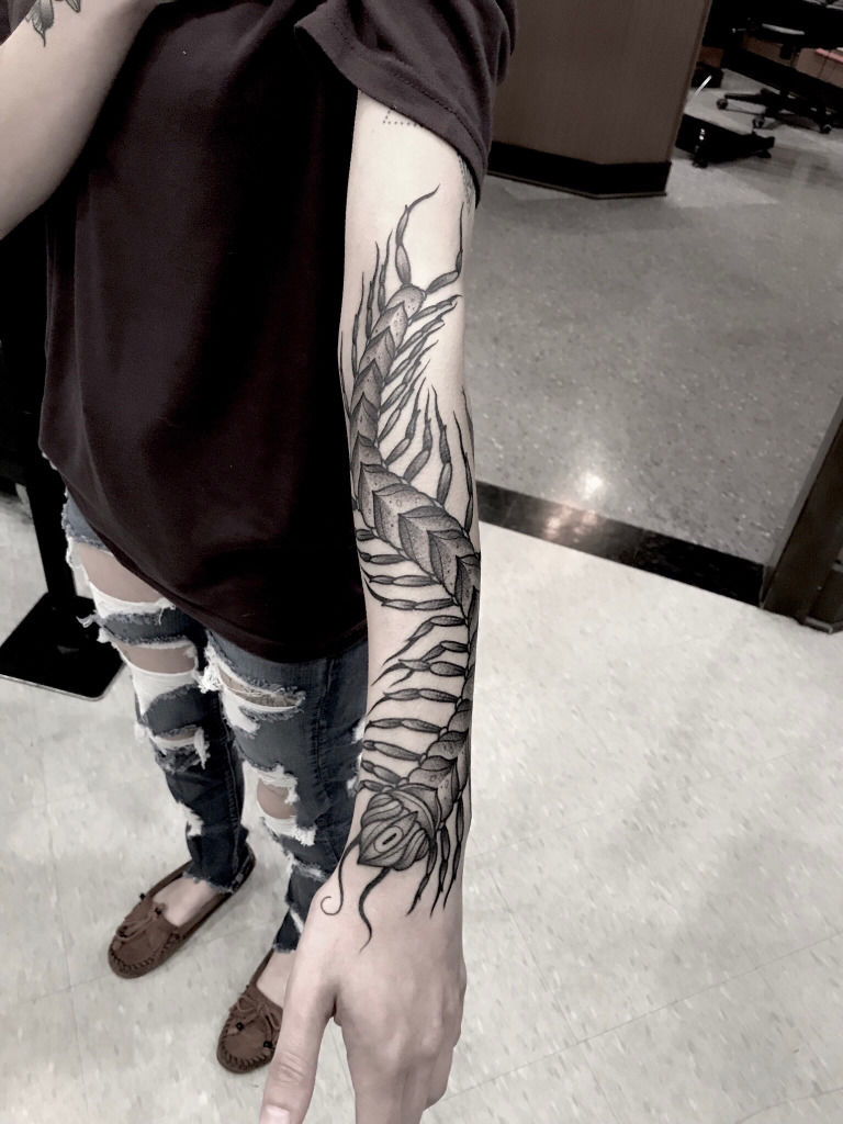 tribal centipede tattoo
