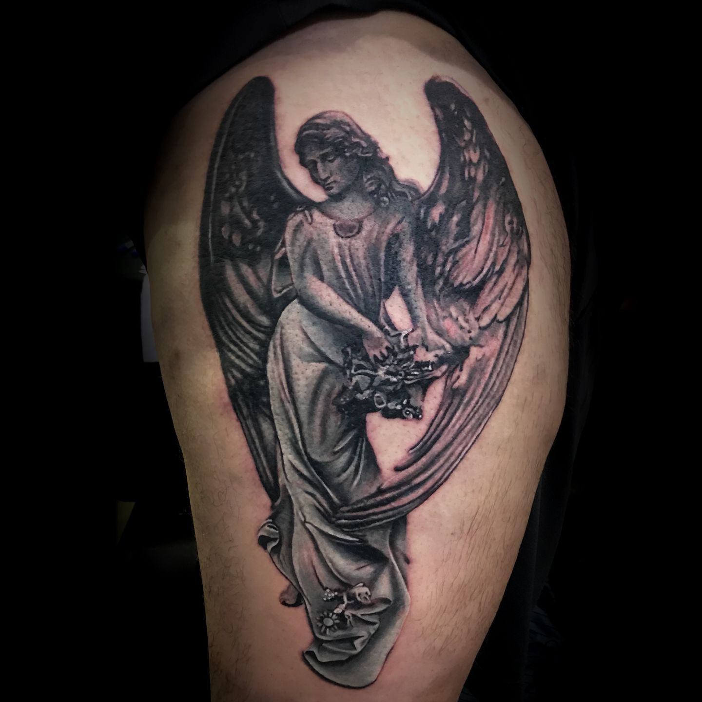 Black And Grey Angel With Clock And Red Rose Tattoo On Arm