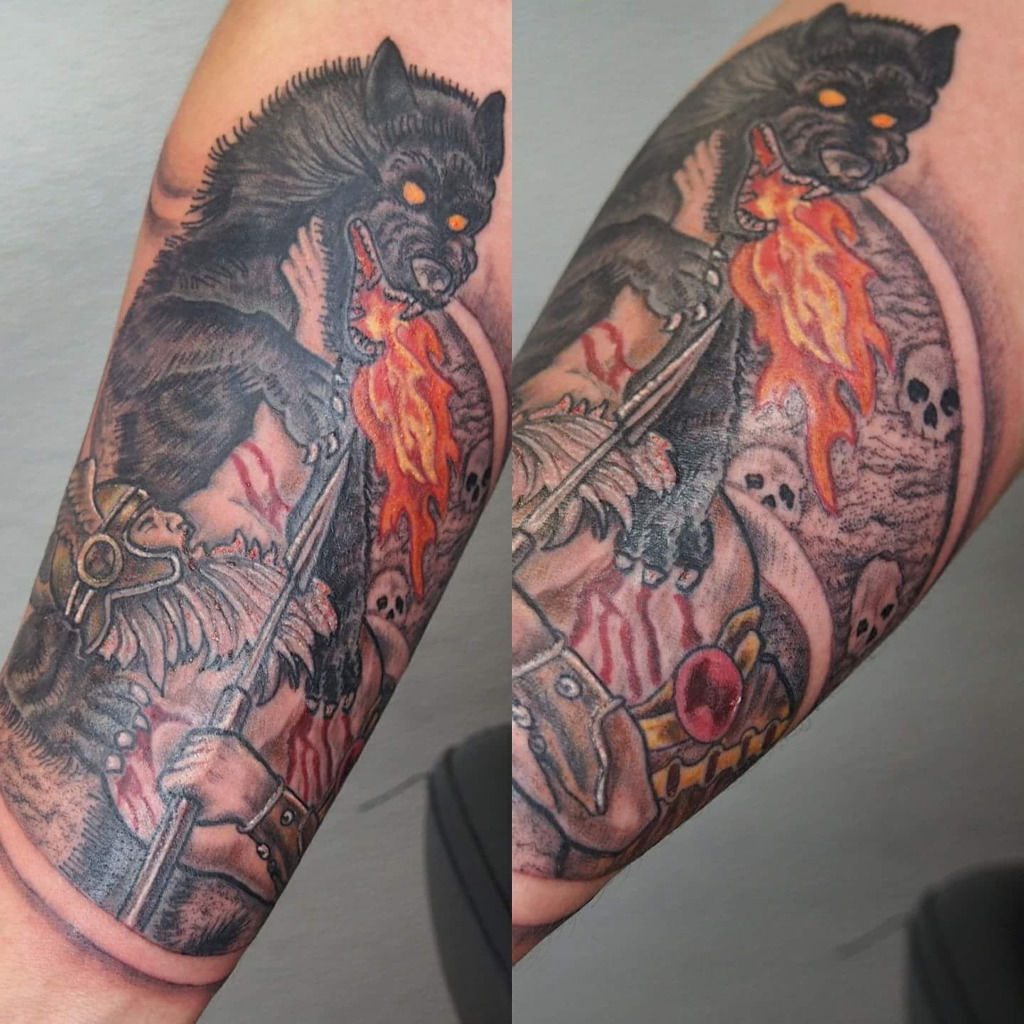 wolves fighting tattoo