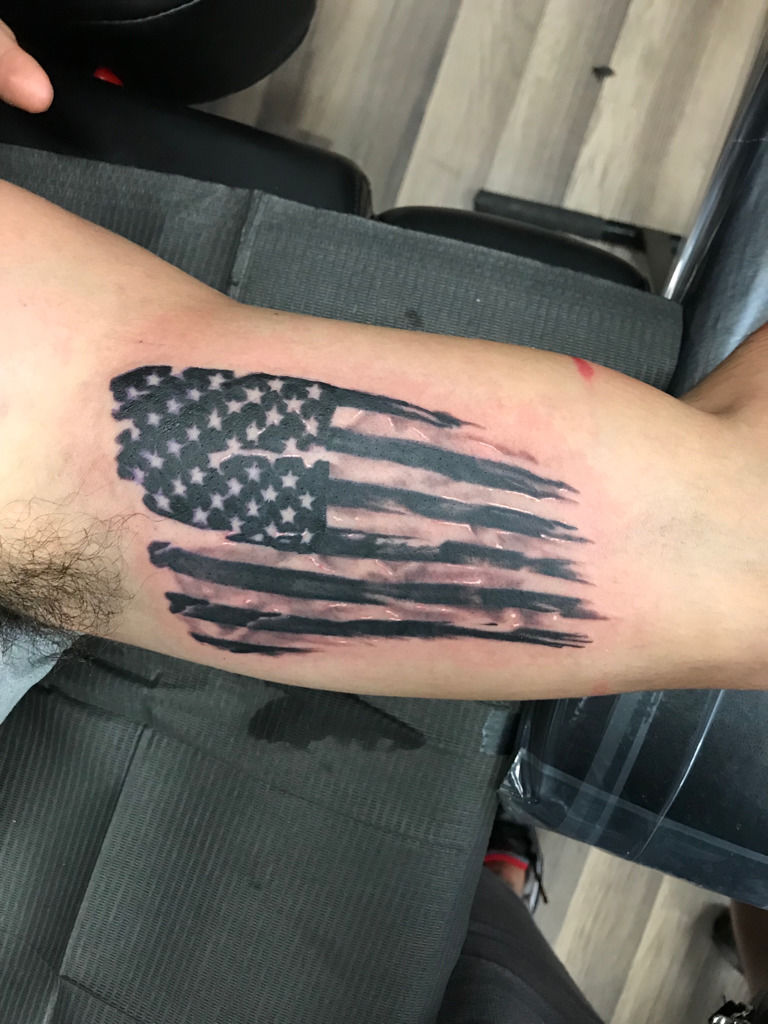 Tattoo uploaded by The Forbidden Images Tattoo Studio  American Pride silk flag  black and gray tattoo project  Tattoodo