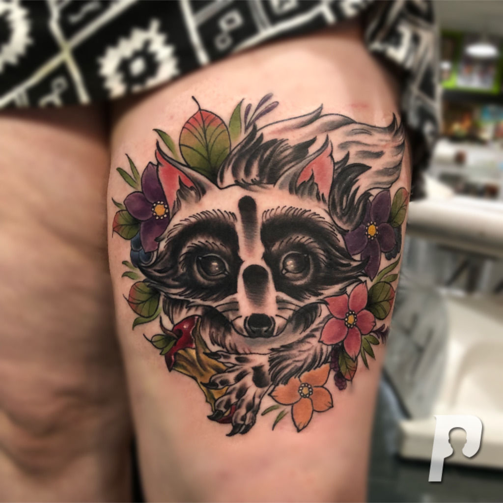 Neotraditional raccoon portrait tattoo done on the