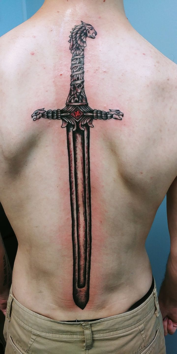 Market Quarter Tattoo  𝐆𝐚𝐦𝐞 𝐨𝐟 𝐓𝐡𝐫𝐨𝐧𝐞𝐬 Valyrian Steel dagger  straight through the knee for thenerdherderuk who sat brilliantly well for  this tough tattoo davewinntattoo is always ready to design custom pieces