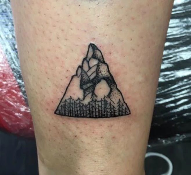 Minimalist dotwork mountain tattoo - Tattoogrid.net