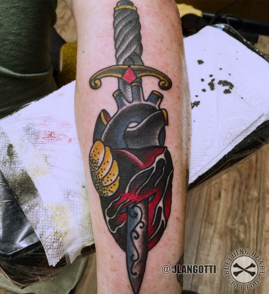 traditional dagger heart tattoo