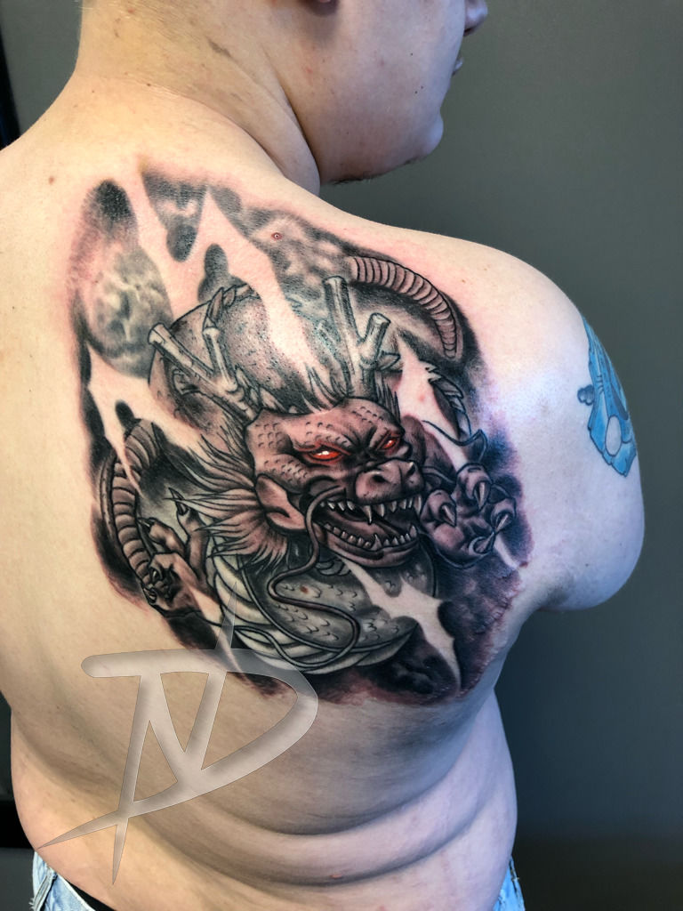 Lost City Tattoo — Anime piece of Naruto/Kyuubi on the shoulder blade...