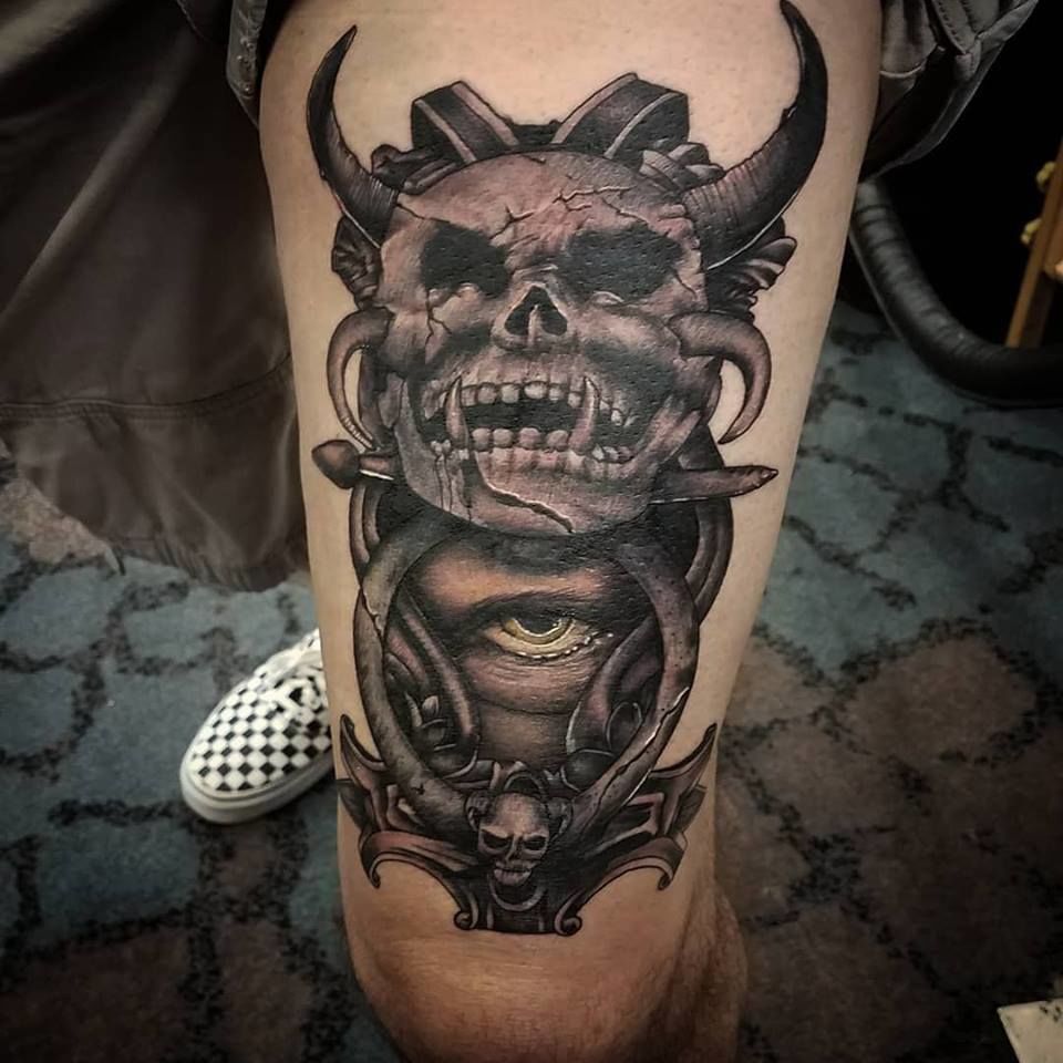evil skull with horns tattoo