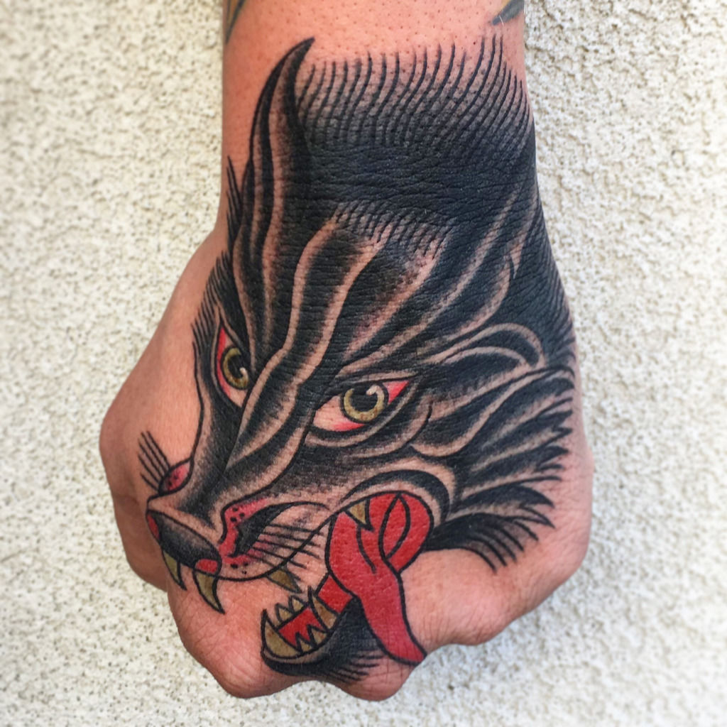 lonelydreamertattoo:wolf-tattoo-tradional-tattoos-omaha-tattoos-hand-tattoos -oldschool-tattoos