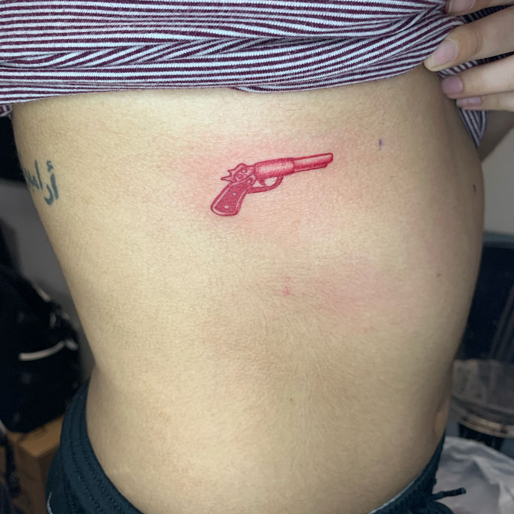 Pistol of love by Massimo De Pase: TattooNOW