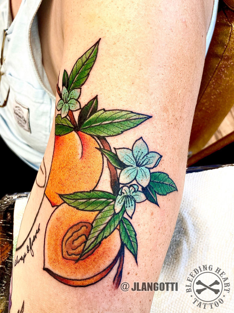 orange blossom color tattoo by Dee Dee TattooNOW