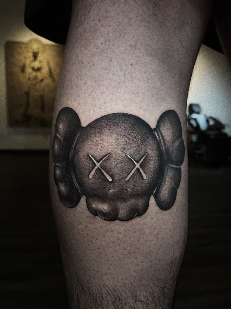 Forearm tattoo on PewDiePie Inspired by a work by Kaws