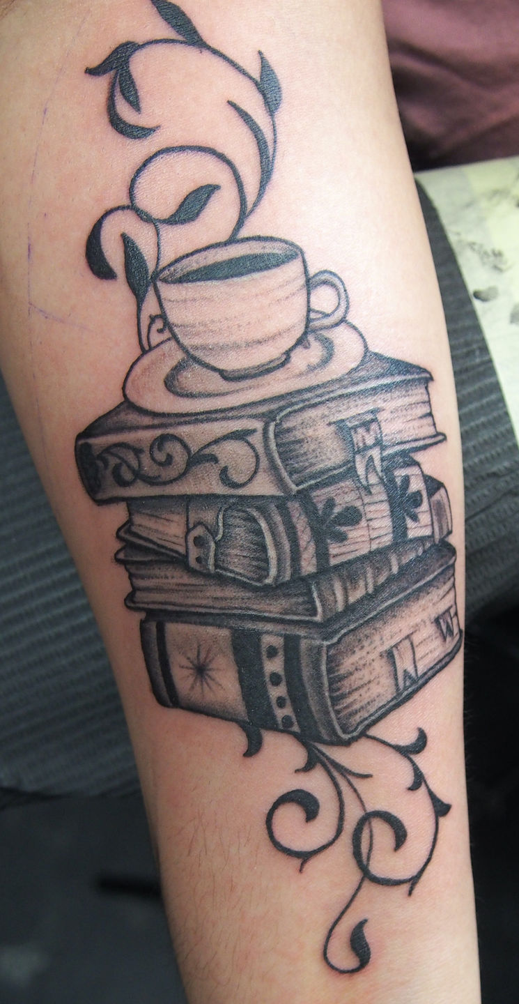 Stack of books swellbow by Alex Eremko Arthouse Calgary AB  rtattoos