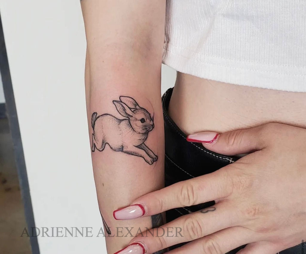 Small rabbit tattoo by Andrei Svetov  Tattoogridnet