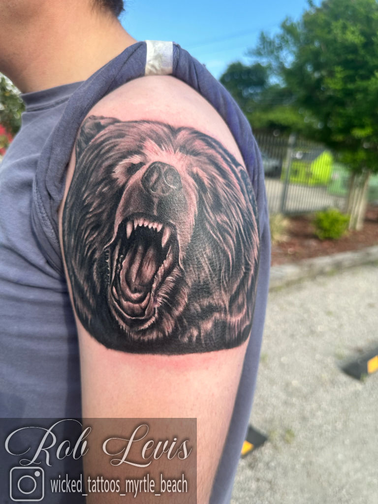 Roaring Bear breaking through the Mist in a Lightning Storm Tattoo Design